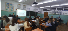 a redmi note 8 pro is being used to take a picture of the classroom