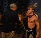 a man is holding a trophy that says survivor 2025