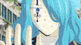a person with blue hair has a tattoo on their face that says " i "