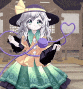 a girl in a purple hat and green dress is holding a heart shaped object