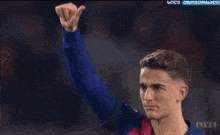 a soccer player wearing a jersey that says ' amike ' on it