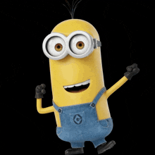 a close up of a minion wearing a blue shirt and overalls