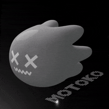 a gray ghost with x 's on it 's face is laying on a black surface