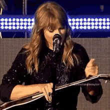 Taylor Swift Guitar Tuning Guitar GIF - Taylor Swift Guitar Tuning Guitar Reputation Stadium Tour GIFs