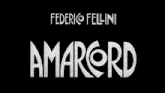 a black and white poster for federico fellini 's amarod