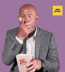 Footballeralanshearer Man-eating-popcorn GIF - Footballeralanshearer Man-eating-popcorn Britishsportcelebrities GIFs