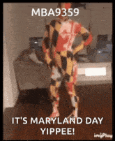 a man in a maryland day outfit is dancing in a living room .