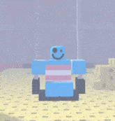 a blue robot with a smiley face is sitting on a chair