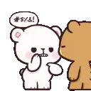 a couple of teddy bears standing next to each other .