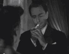 Now Voyager - Paul Henreid - Cigarettes GIF - Now Voyager Paul Henreid GIFs