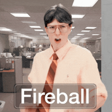 a man wearing glasses and a tie is standing in an office with a sign that says fireball