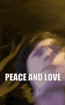 a blurred image of a person with the words peace and love on the bottom