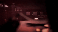 a blurry picture of a dark room with a lot of lights