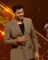 a man in a suit is being interviewed by a woman with a microphone