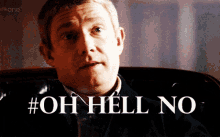 a man sitting in a chair with the words oh hell no written on the bottom
