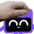 a hand is holding a purple object with a face .