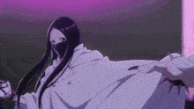 a woman with long black hair and a mask on her face is standing in front of a purple light .