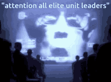a group of people looking at a screen with the words " attention all elite unit leaders "