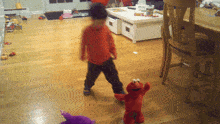 Elmo Kick GIF - Elmo Kick Shove GIFs