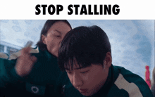 a picture of a girl and a boy with the words stop stalling below them