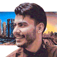 a pixelated image of a man with a beard smiling