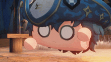 a cartoon character wearing a blue hat with a ninja symbol on it