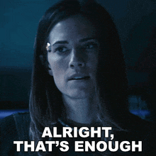 a woman says alright that 's enough in white letters