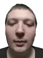 a close up of a man 's face with his eyes closed and his mouth open