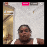 a woman 's face is shown on a tik tok video