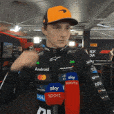 a man wearing a black shirt that says android and sky sports