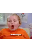 a little girl is crying while eating a bowl of food with chopsticks