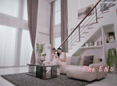 two women sit on a couch in a living room with the end written on the bottom