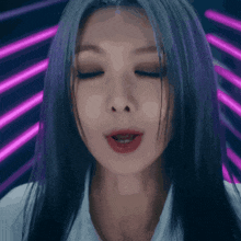 a close up of a woman with purple hair