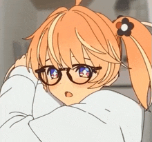 a girl with glasses and a flower in her hair looks surprised