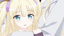 a girl with blonde hair and blue eyes is covering her face with her hand