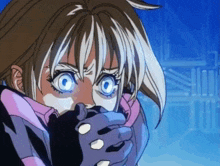 a close up of a girl with blue eyes covering her mouth