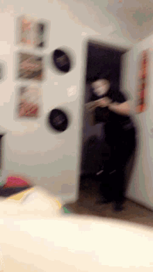 a blurry picture of a person in a room