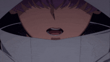a close up of a person 's face with their mouth wide open