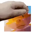 a pixel art of a hand holding a piece of paper with a picture of a dog on it .