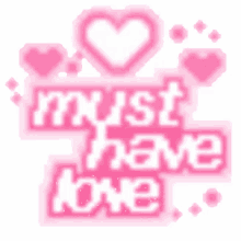a pink sign that says `` must have love '' with a heart in the middle .