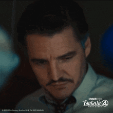 a close up of a man 's face with the fantastic 4 first steps written in the corner