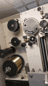 a machine has a warning sign on the side of it that says do not touch