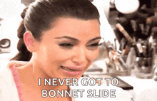 a woman is crying with the words i never got to bonnet slide below her