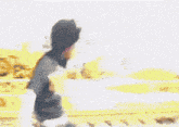 a blurry picture of a person in a hooded jacket