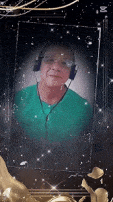 a man wearing headphones and glasses is in a frame