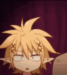 a cartoon character with yellow hair and ears is making a face .