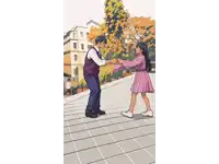a man in a purple vest and a woman in a pink dress are walking down a sidewalk