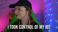 a woman wearing a black hat and glasses says i took control of my ibs
