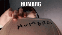 the word humbrg is written on the back of a box