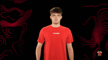 a man in a red shirt is making a surprised face